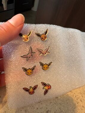 Pokemon Yellow and Orange Eevee-Variant Stud Earrings Set. Never worn